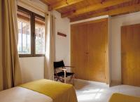 A bed or beds in a room at Viviendas Los Olivos - Formentera Break