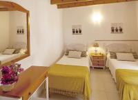 A bed or beds in a room at Viviendas Los Olivos - Formentera Break