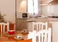 A kitchen or kitchenette at Viviendas Los Olivos - Formentera Break