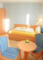 Postel nebo postele na pokoji v ubytování Gasthaus Jütte