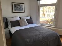 Ein Bett oder Betten in einem Zimmer der Unterkunft Bridge Inn