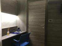 A television and/or entertainment centre at Hotel Mediterranée