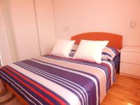 Posteľ alebo postele v izbe v ubytovaní Apartman Karlo