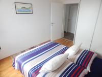 Posteľ alebo postele v izbe v ubytovaní Apartman Karlo