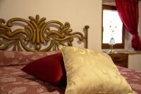 A bed or beds in a room at SassoMatto b&b BioAgrituRelax