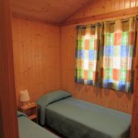 Postel nebo postele na pokoji v ubytování Camping-Bungalows Ciudad de Albarracín