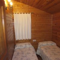 Postel nebo postele na pokoji v ubytování Camping-Bungalows Ciudad de Albarracín