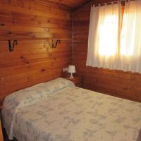 Postel nebo postele na pokoji v ubytování Camping-Bungalows Ciudad de Albarracín