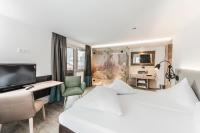 Posteľ alebo postele v izbe v ubytovaní Lifesport Hotel Hechenmoos