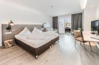 Posteľ alebo postele v izbe v ubytovaní Lifesport Hotel Hechenmoos
