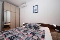 Posteľ alebo postele v izbe v ubytovaní Family Apartments Marita
