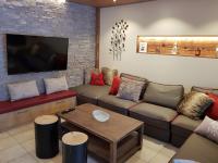 Televízia a/alebo spoločenská miestnosť v ubytovaní Exclusive Apartment Sylvie