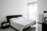 A bed or beds in a room at Bed & Breakfast Cesarina