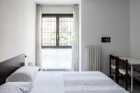 A bed or beds in a room at Bed & Breakfast Cesarina