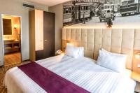 Posteľ alebo postele v izbe v ubytovaní Holiday Inn Budapest-Budaörs by IHG