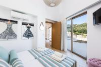 Postel nebo postele na pokoji v ubytování Summer Villas Crete
