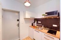 Kuchyňa alebo kuchynka v ubytovaní Pomorskie Apartamenty Biała Mewa