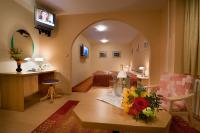 Telewizja i/lub zestaw kina domowego w obiekcie Grand Hotel