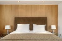 Posteľ alebo postele v izbe v ubytovaní Daios Luxury Living