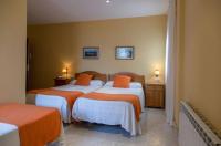 Posteľ alebo postele v izbe v ubytovaní Hotel Villa del Son