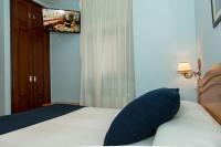 Posteľ alebo postele v izbe v ubytovaní Hotel Villa del Son