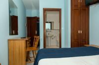 Posteľ alebo postele v izbe v ubytovaní Hotel Villa del Son