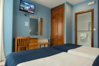 Posteľ alebo postele v izbe v ubytovaní Hotel Villa del Son