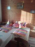 A bed or beds in a room at Gasthof Steiner