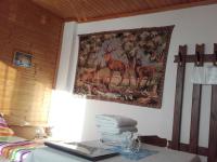 A bed or beds in a room at Gasthof Steiner