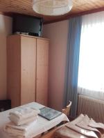 A bed or beds in a room at Gasthof Steiner
