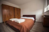 Posteľ alebo postele v izbe v ubytovaní RiverView apartment