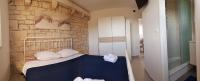 Postel nebo postele na pokoji v ubytování Holiday Home Gustirna
