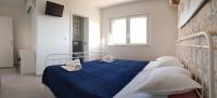 Postel nebo postele na pokoji v ubytování Holiday Home Gustirna
