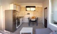 Kuchyň nebo kuchyňský kout v ubytování Holiday Home Gustirna