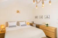 Hotel Szlak Bursztynowyにあるベッド