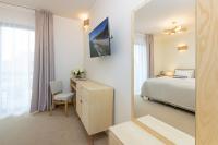 Hotel Szlak Bursztynowyにあるベッド