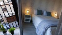 Posteľ alebo postele v izbe v ubytovaní Casa del Maestro