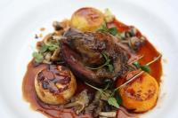 a plate of food with meat and mushrooms and sauce at Appleby Manor Hotel & Garden Spa in Appleby