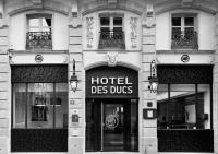 a hotel des bugs sign on the side of a building at Hôtel des Ducs in Dijon