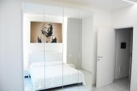 A bed or beds in a room at Maison Audrey
