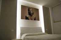 A bed or beds in a room at Maison Audrey