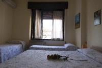 Posteľ alebo postele v izbe v ubytovaní Hotel Primavera