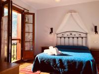 Postel nebo postele na pokoji v ubytování Hotel San Francisco Rural