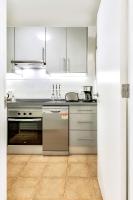 Kuchnia lub aneks kuchenny w obiekcie Ocean Pearl Apartment