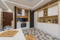 Kuchyňa alebo kuchynka v ubytovaní P&O Corporate Serviced Apartments Cybernetyki