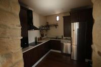 Kuchyňa alebo kuchynka v ubytovaní Apartamentos Deluxe Calle Corredera