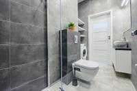 Łazienka w obiekcie Apartamenty Sun & Snow Mila Baltica