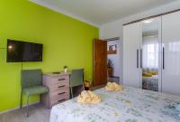 Posteľ alebo postele v izbe v ubytovaní Apartments Ani