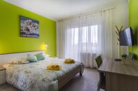 Posteľ alebo postele v izbe v ubytovaní Apartments Ani