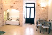 A bed or beds in a room at Dimora Morello